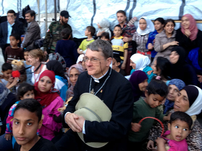 Father Dave with refugees from Yarmouk (April 2014)