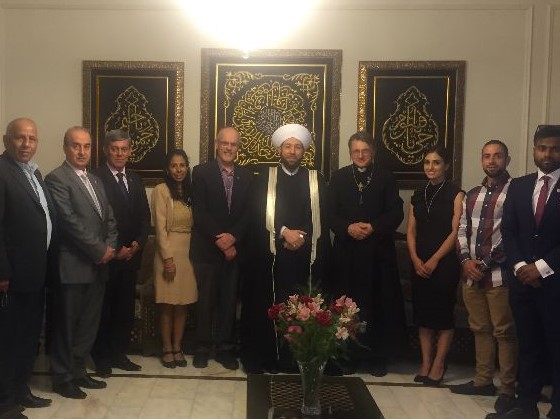 Tim Anderson and Father Dave with the Grand Mufti and friends